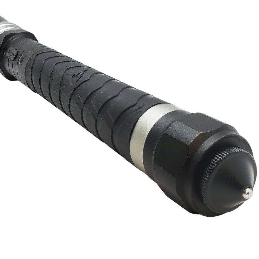 Close-up of the handle and the pointed glass-breaker tip on the end of Safety Tech Bouncer stun gun baton