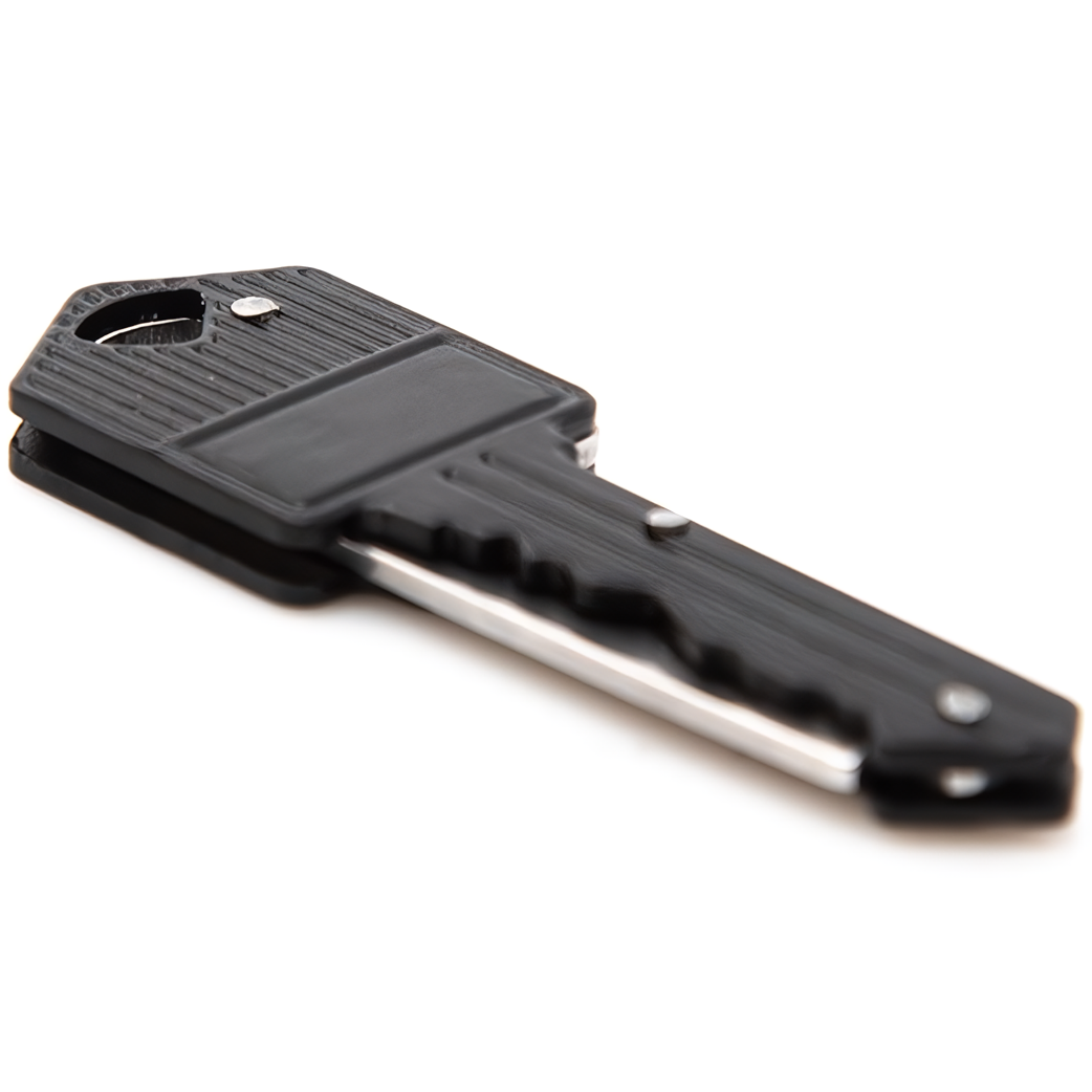 a left angle of the Key Knife from the Stun Gun & Pepper Spray Self-Defense Keychain Weapon Set