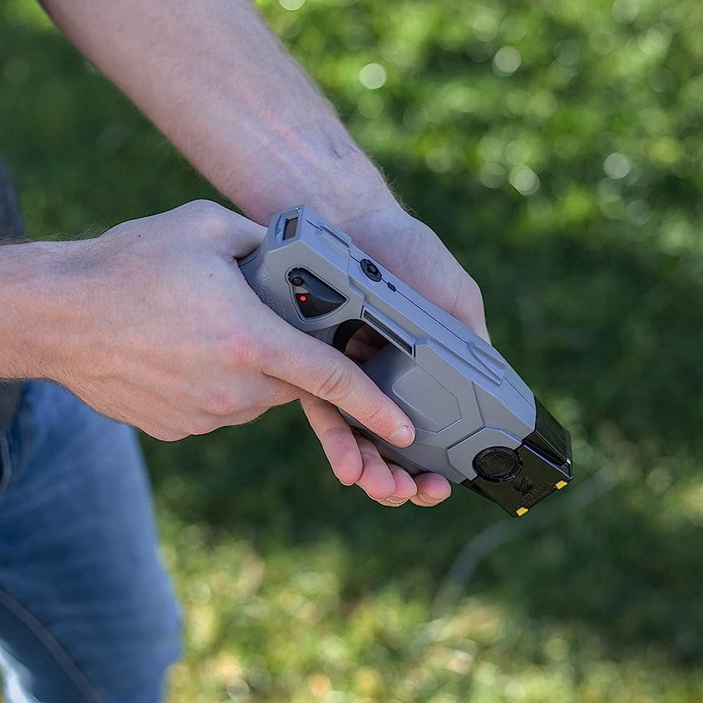 a hand reloading the TASER X1 Reloadable Shooting Stun Gun