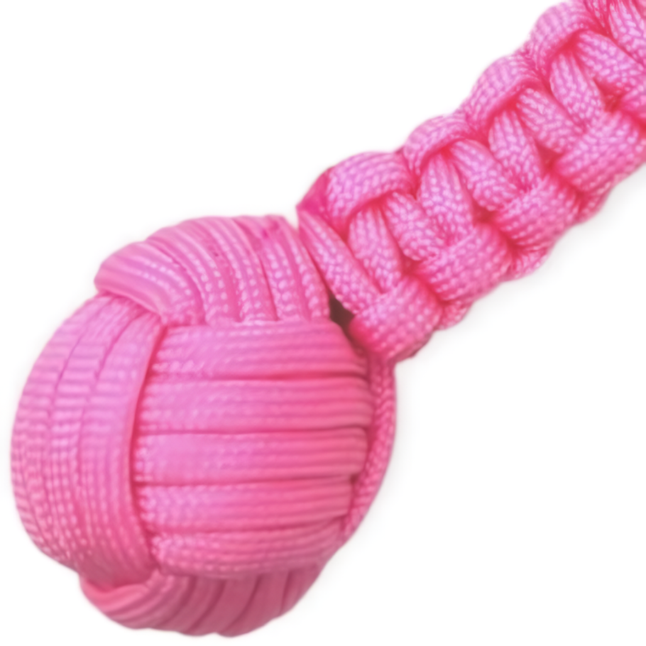 a closeup view of a pink WeaponTek SAP Monkey Fist Self-Defense Keychain Weapon's ball knot