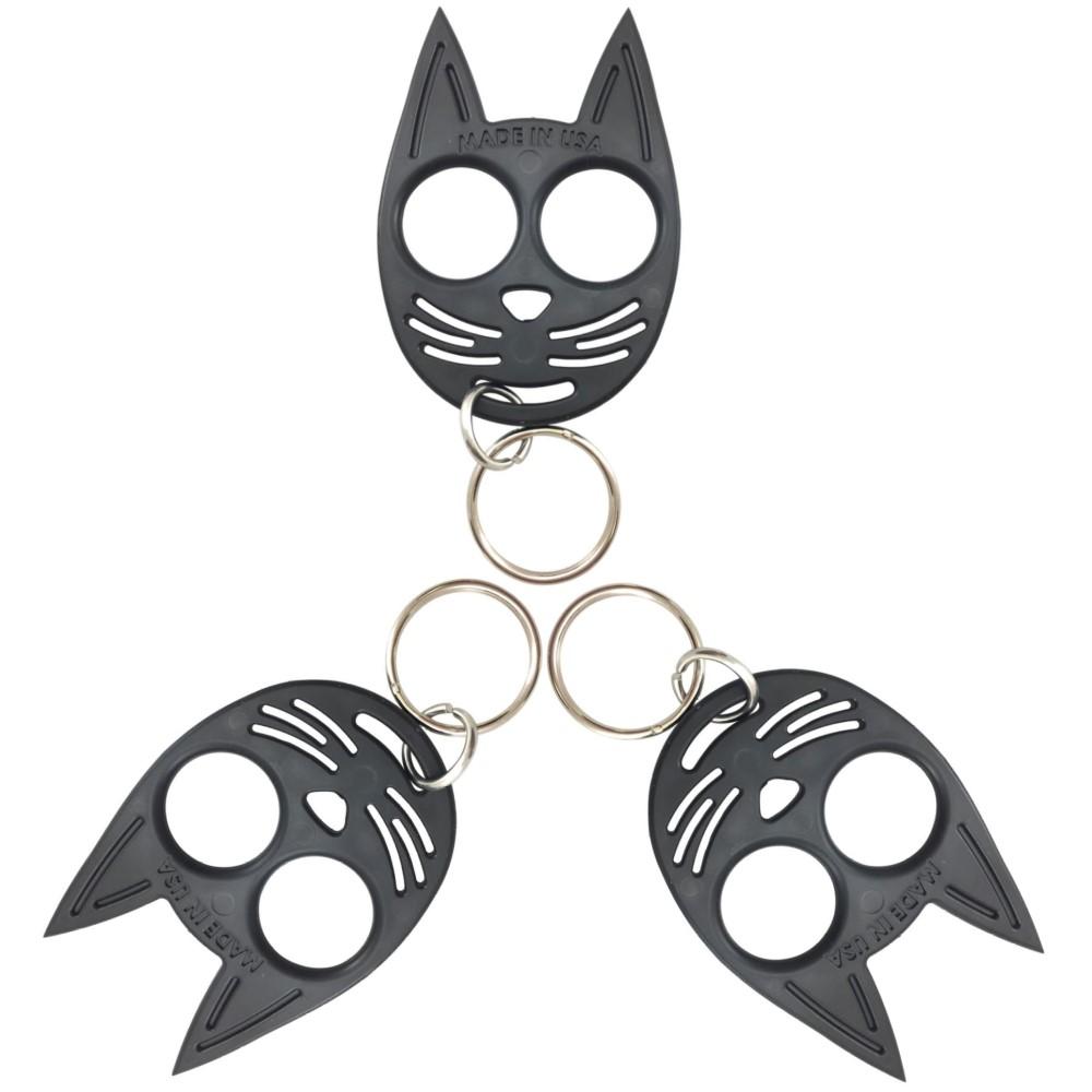 Three black cat-shaped self-defense keychains arranged in a triangular pattern