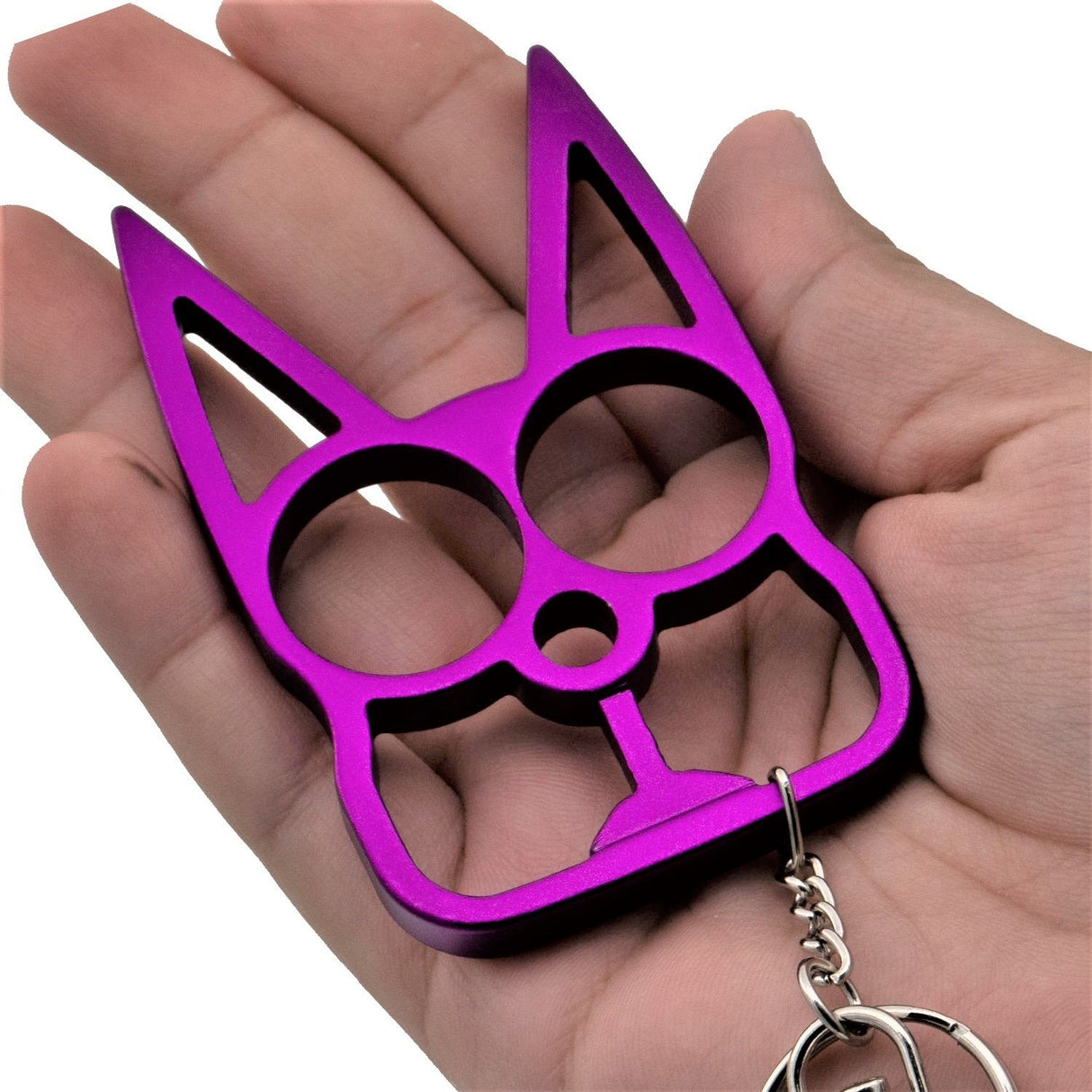 Hand holding a WeaponTek Cat Keychain Self-Defense Metal Knuckle Weapon