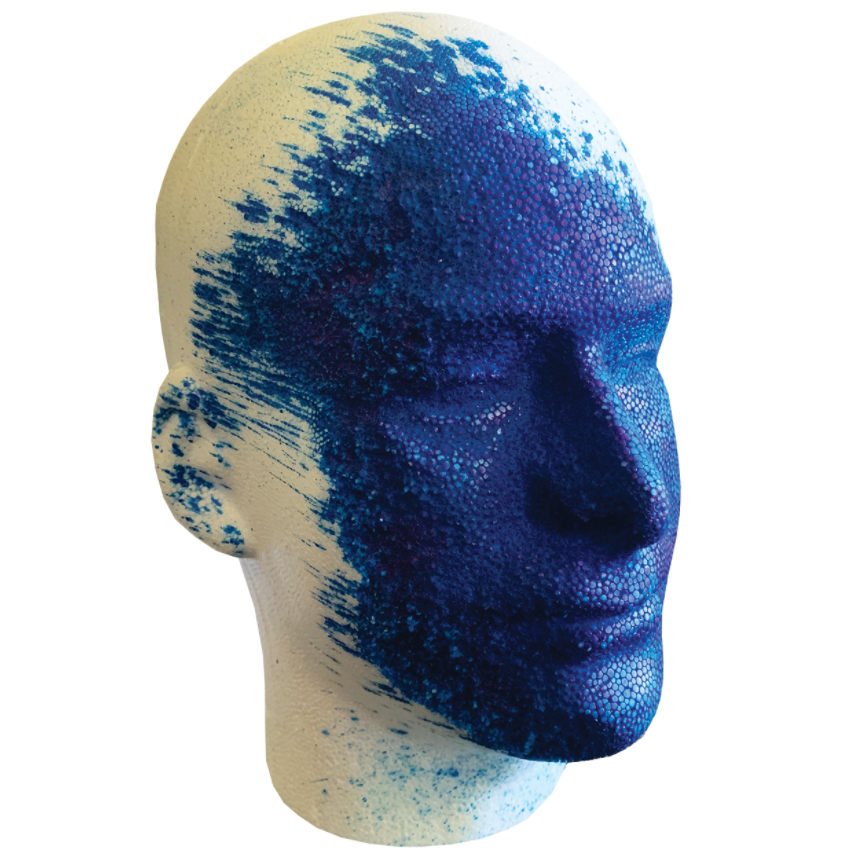 Head Mannequin with blue Marking dye from Eliminator Blue Heat Keychain Pepper Spray