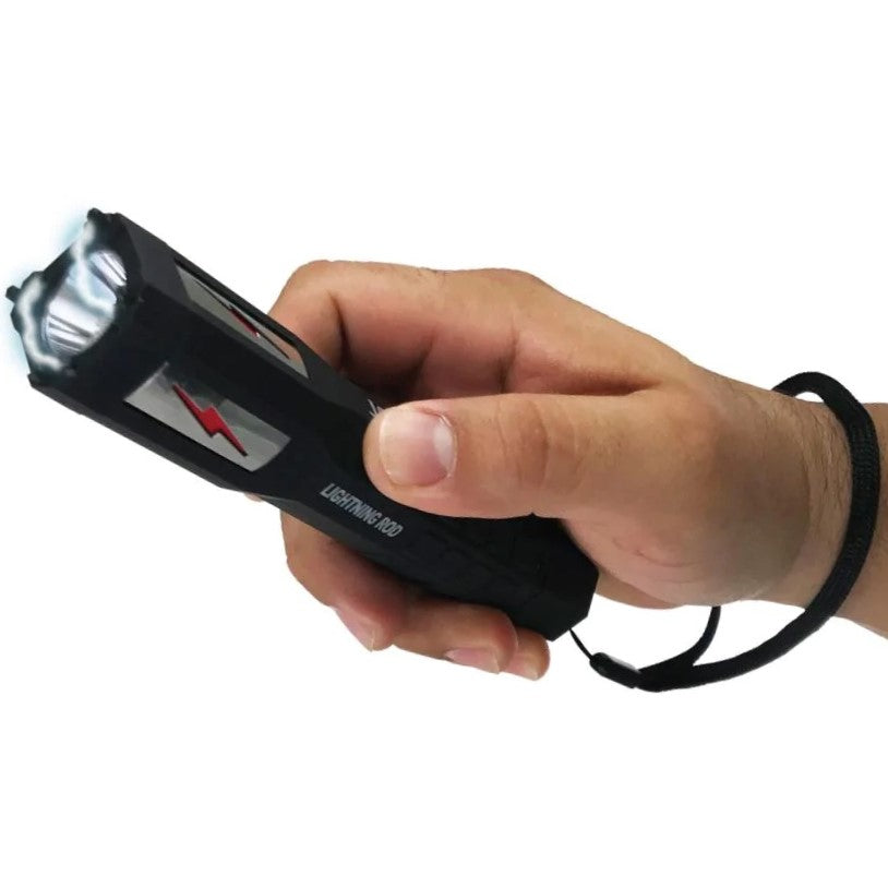JOLT Lightning Rod Stun Flashlight with wrist strap in hand