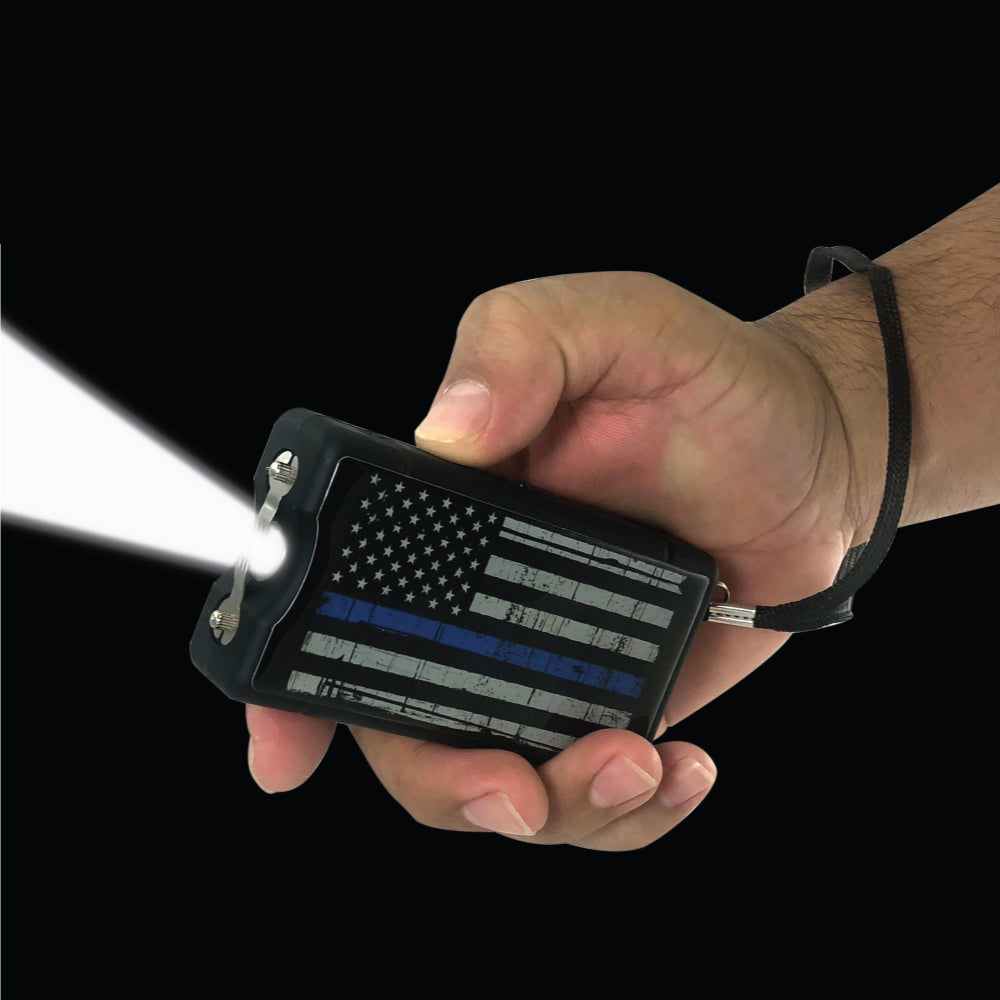 Police Force Tactical Blue Line Stun Gun with flashlight displayed