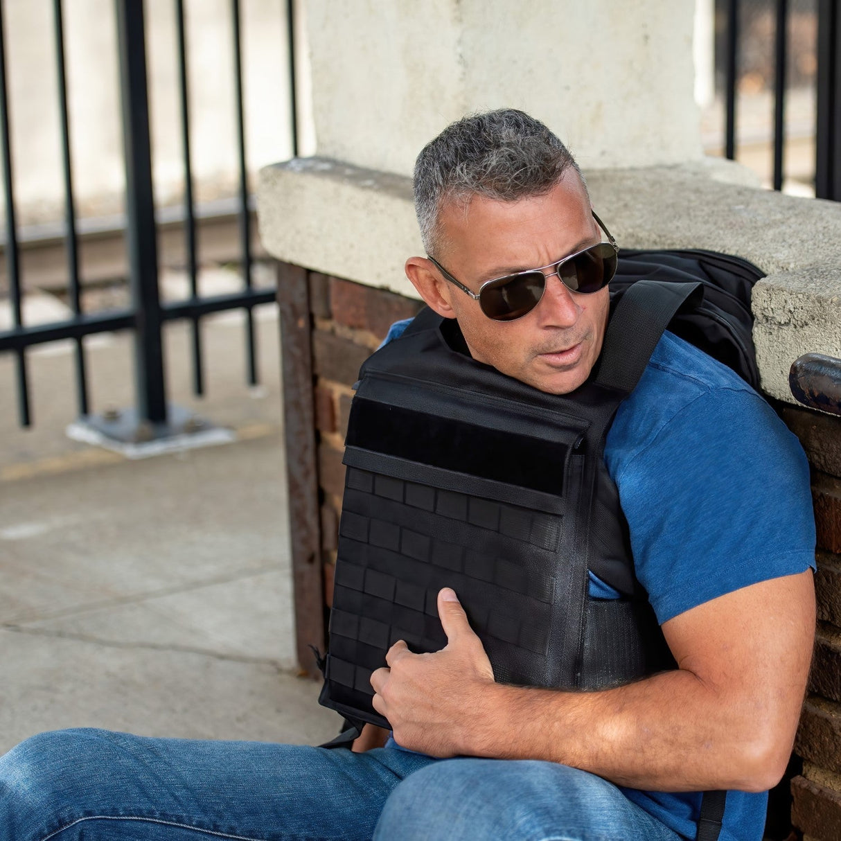 man wearing bullet proof armor