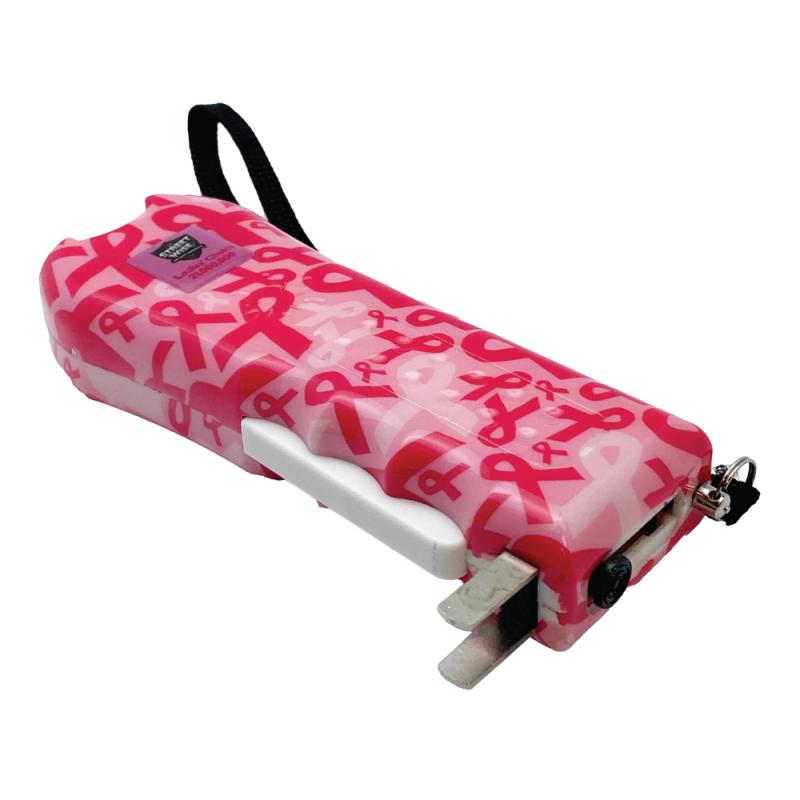 Pink Street Wise Ladies' Choice stun gun in a pink ribbon pattern and a wrist lanyard and built-in charging prongs
