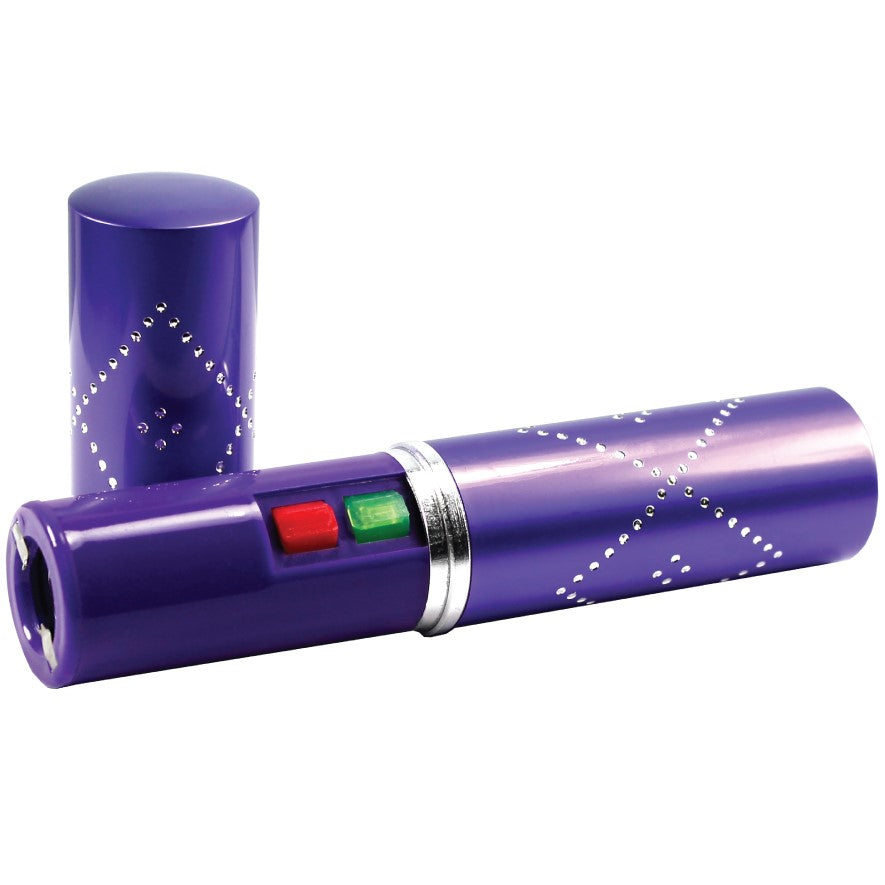 Opened Violet stun gun disguised as a perfume or lipstick tube