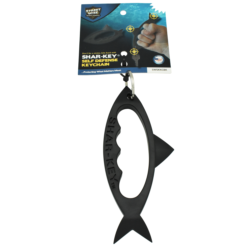 Black shark-shaped self-defense keychain from Streetwise in packaging
