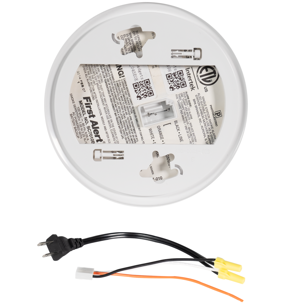 Back of a Spywifi Smoke Detector Hidden Spy Camera with warning labels with its wiring harness