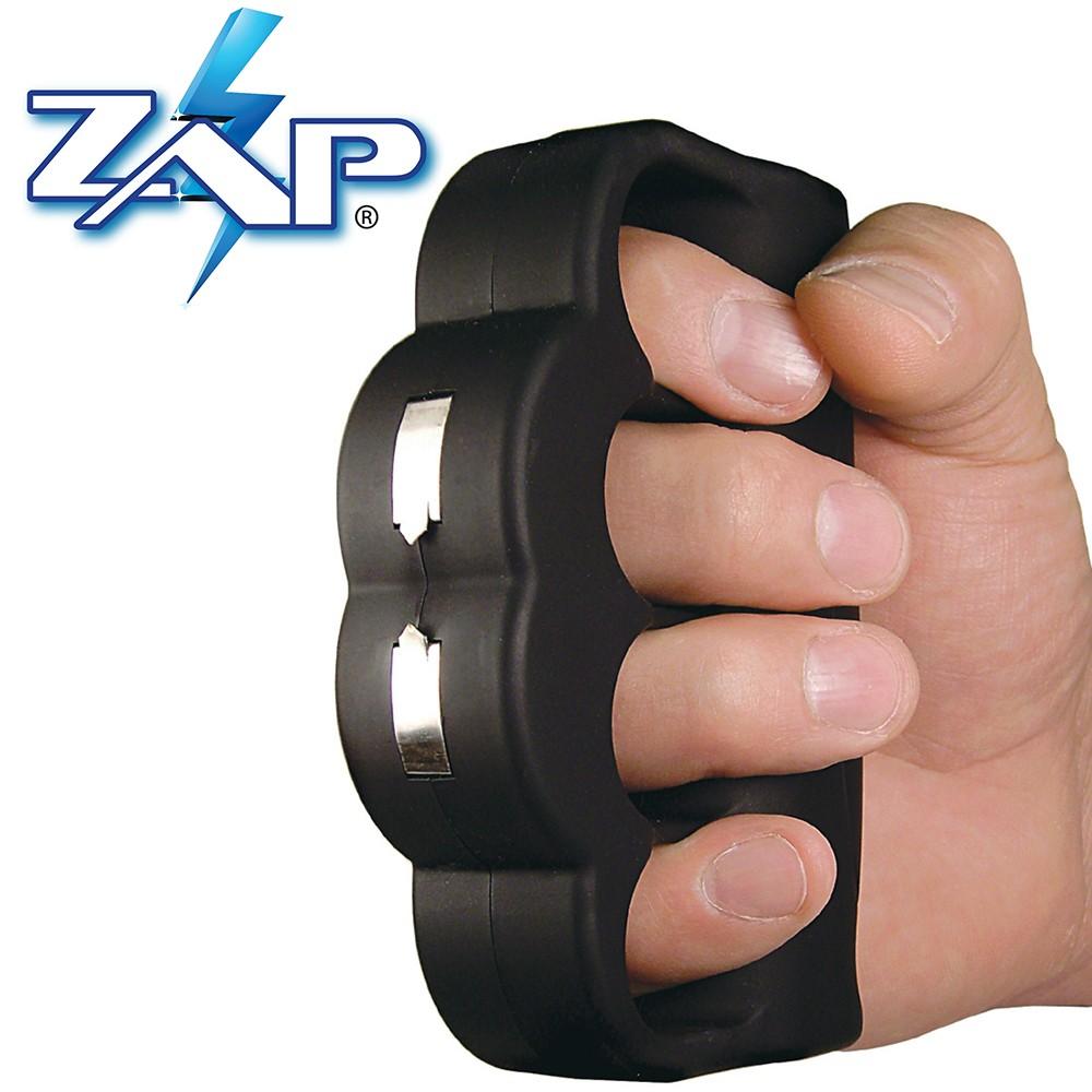a hand gripping a ZAP™ Blast Knuckles Stun Gun Black w/ Holster 950K