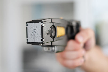 loaded stun gun in a hand