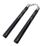 Pair of black nunchaku with silver tips on a white background