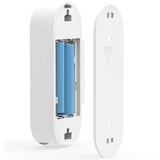 Diagram showing the interior battery compartment of the door sensor, which uses two AAA batteries.