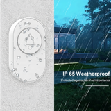 Crow Alert Smart WiFi Waterproof Doorbell Visitor Chime Alarm 85dB mounted in an outdoor wall while raining showing its weatherproof design