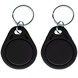 Two black circular RFID key fobs on metal rings for quick arming or disarming of Crow Alert Smart WiFi Wireless Home Security 4G Alarm System