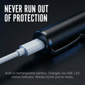 Streetwise Pain Pen connected to a charging cable. 