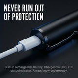 Streetwise Pain Pen connected to a charging cable. 