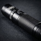 A close up view of Police Force Tactical Rechargeable Stun Gun Flashlight 9.2M highlighting its metal prongs
