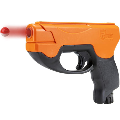 Orange and black Prepared 2 Protect HDP 50 Compact Self-Defense Pepper Ball Gun shooting a projectile