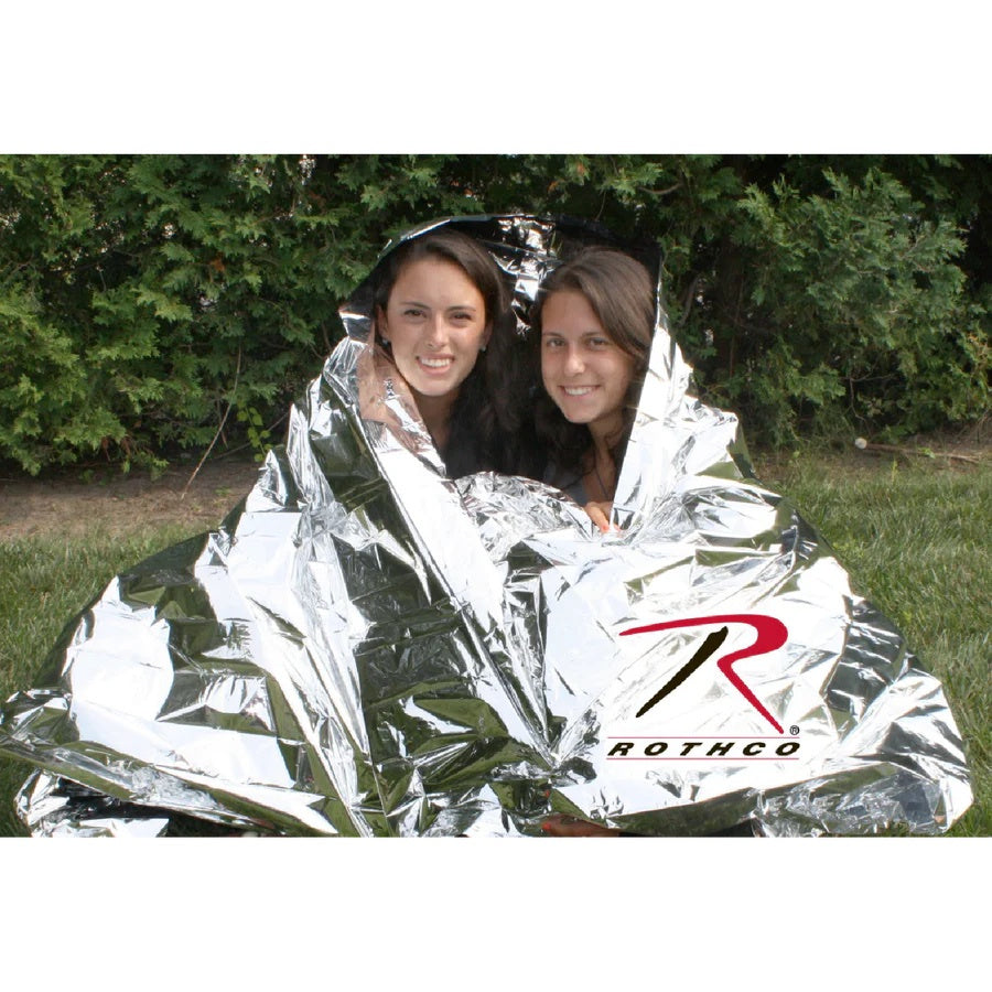 2 person wrapped in one Rothco Polarshield Polyester Thermal Survival Blanket