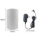 Safety Tech Virtual K9 Motion Detector Electronic Barking Dog next to its charger