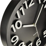 Close up view of a SpyWfi Wall Clock Hidden Motion Detection Spy Camera 1080p HD WiFi