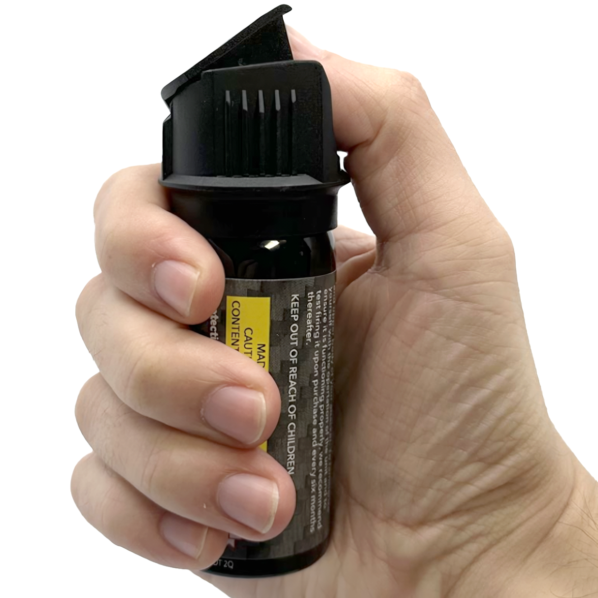 A hand pressing a Streetwise Police Strength Sticky Gel Pepper Spray 2 oz.
