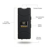 Black S.M.A.C.K. stun gun with labeled features on a white background