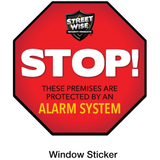 Red window STOP sign sticker with the text: STOP! THESE PREMISES ARE PROTECTED BY AN ALARM SYSTEM