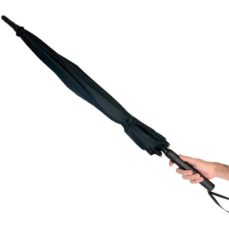 a hand holding a black Streetwise Tactical Stunbrella Disguised Rechargeable Stun Gun.