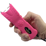 a hand holding a Streetwise™ Touchdown Rechargeable LED Stun Gun 89M