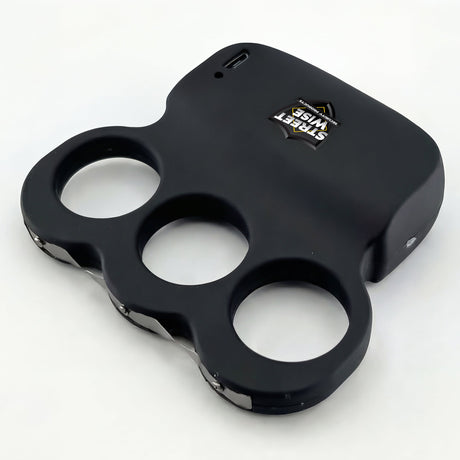  a top angle view of the Streetwise Triple Sting Ring Rechargeable Stun Gun showcasing its metal prongs.