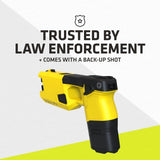 Image of a TASER 7 CQ Home Defense Shooting Stun Gun with promotional text: 'TRUSTED BY LAW ENFORCEMENT + COMES WITH A BACK-UP SHOT'.