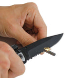 a hand using Tiger-USA 5-in-1 EDC Folding Survival Pocket Knife with a Fire Starter