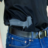 a Uncle Mike's Size 5 IWB Right Hand Holster on waist