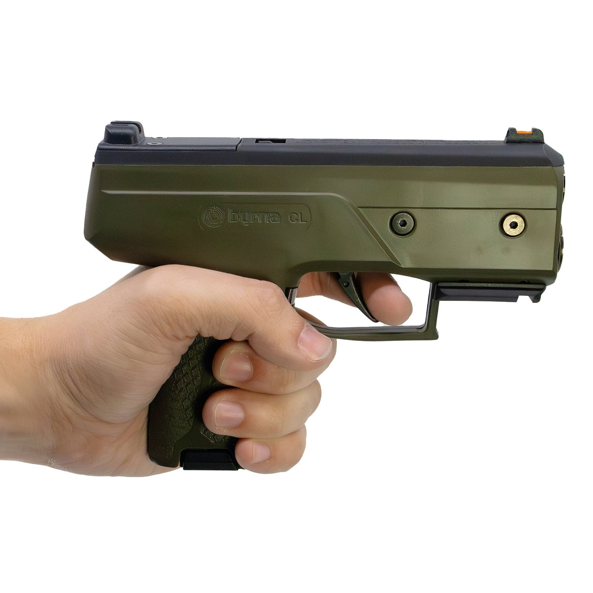 Close-up of green Byrna CL self-defense launcher with ergonomic grip in hand with finger on trigger