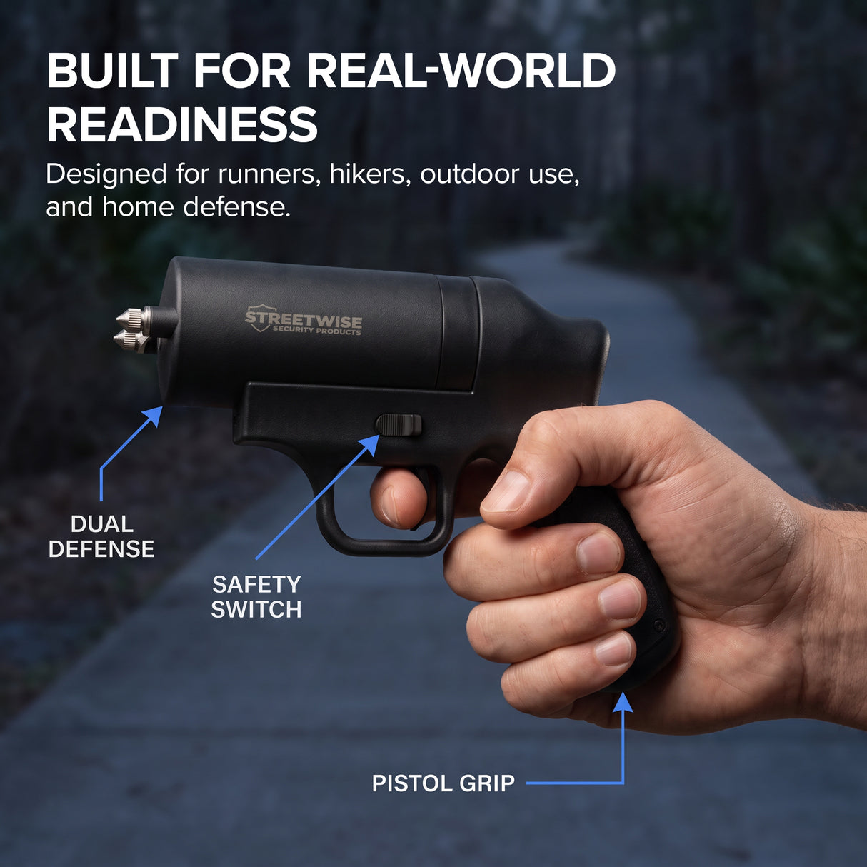 Streetwise Double Defender stun gun and pepper gel device held in hand showing pistol grip and safety switch