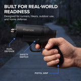 Streetwise Double Defender stun gun and pepper gel device held in hand showing pistol grip and safety switch