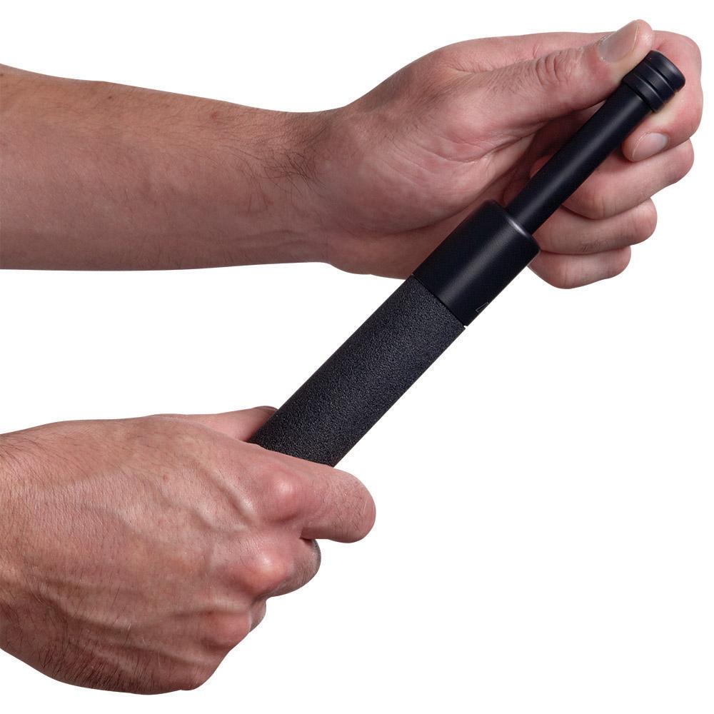 A hand closing a partially extended 24" ASP Talon Infinity Black Chrome Foam Button Expandable Baton