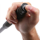 A hand pushing the release button of 24" ASP Talon Infinity Black Chrome Foam Button Expandable Baton