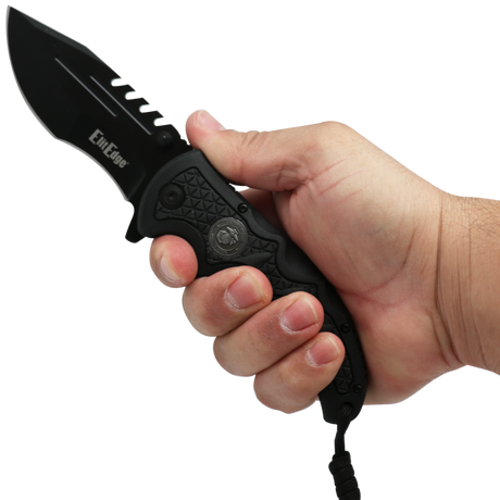 Hand holding an open Black 3.5" folding stainless steel pocket knife with paracord by Elite Edge