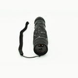 A bottom view of 75M JOLT RhineStun Gun Rechargeable Flashlight showing its charging port and switch
