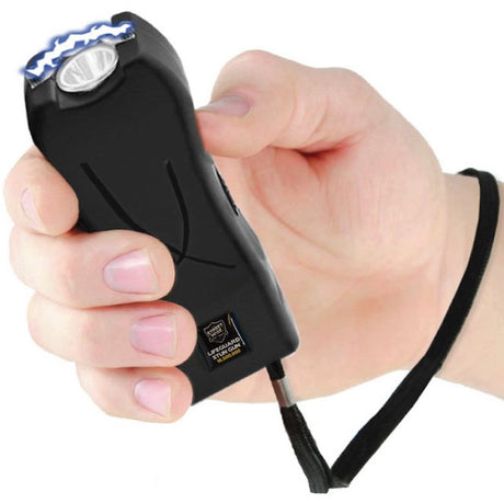 Black Streetwise Lifeguard Mini Rechargeable Stun Gun with wrist strap in hand