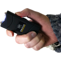 a hand holding a Black Streetwise 16M Stun Gun