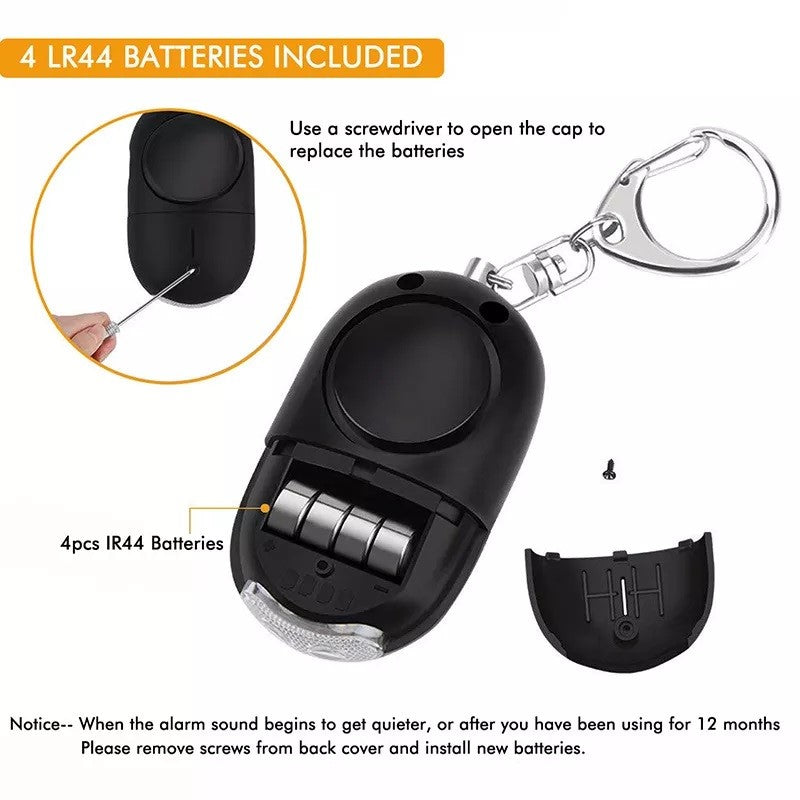 Instructional diagram showing how to replace the four included LR44 batteries by unscrewing the back cover of the Crow Alert Personal Pull Pin Panic Alarm