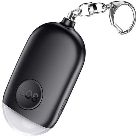 A black Crow Alert Rechargeable SOS LED Personal Panic Alarm 130dB attached to a keychain.