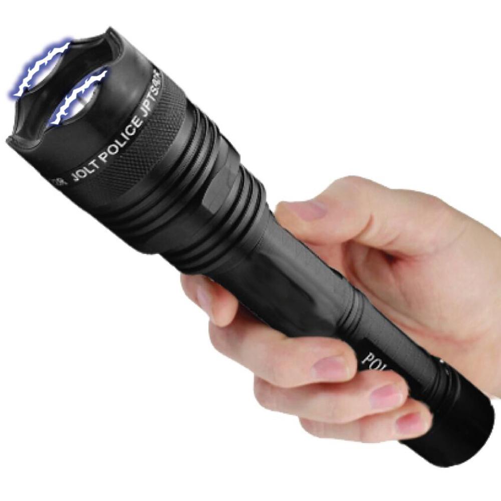 A hand holding a black JOLT Rechargeable Police Stun Gun Flashlight 95M