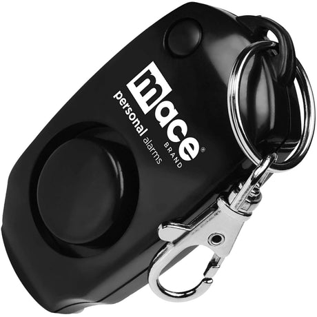 A black Mace Personal Keychain 130dB Panic Alarm with Whistle, featuring a large button and a keyring.