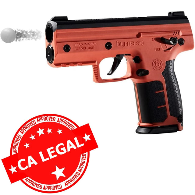 An orange and black Byrna SD Kinetic Non-Lethal CA Legal Projectile Gun with a white projectile loaded, marked as CA Legal.